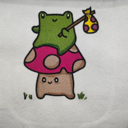 Cute Frog On A Mushroom