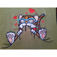 Cat Chewing On Fabric