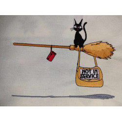 Black cat on broomstick