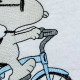 Nosey Dog On Bicycle