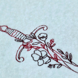 A Sword Adorned With Flowers And Leaves