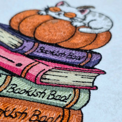 Sleeping Cat on Pumpkin And Books