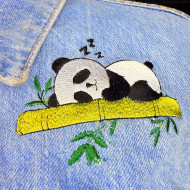 Sleeping Panda On Bamboo