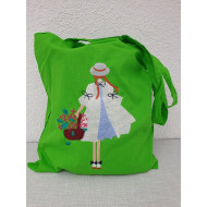 Girl Holding A Flower Basket