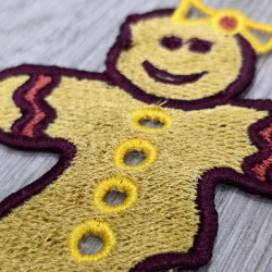 Bitten FSL Gingerbread Girl With Bow