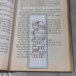 Cat Sleepin On Book Stack ITH Bookmark