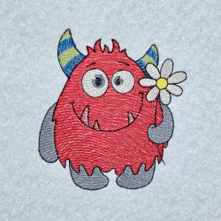 Cute LIttle Monster Holding A Daisey