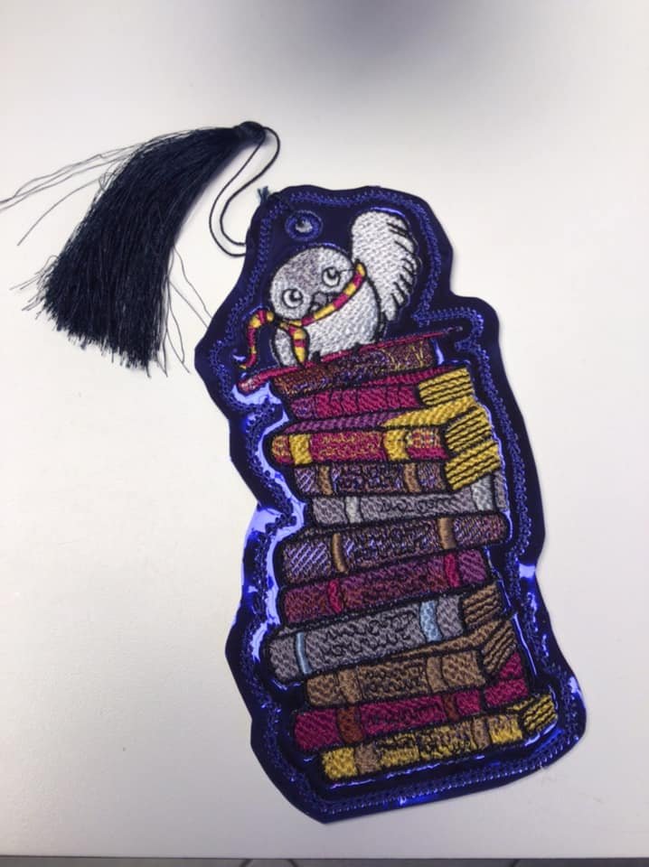 Owl Standing On Books