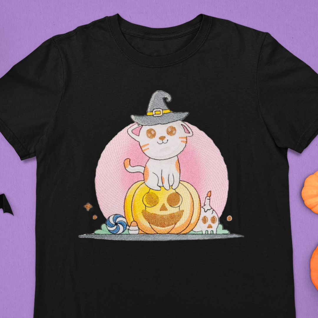 Cute Cat On Halloween Pumpkin