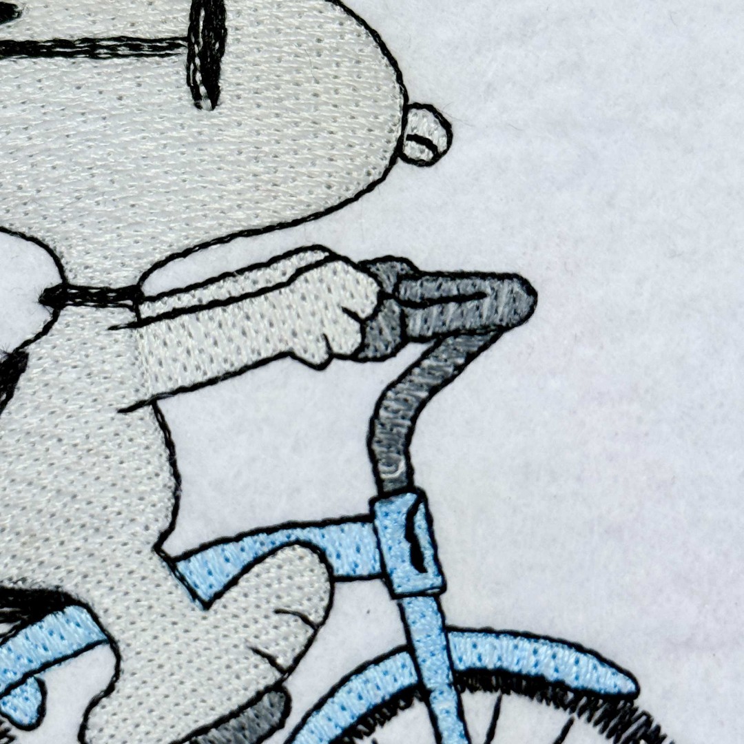 Nosey Dog On Bicycle