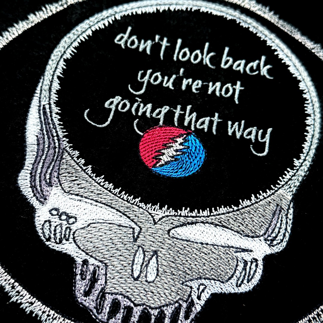 Don't Look Back Skull Quote
