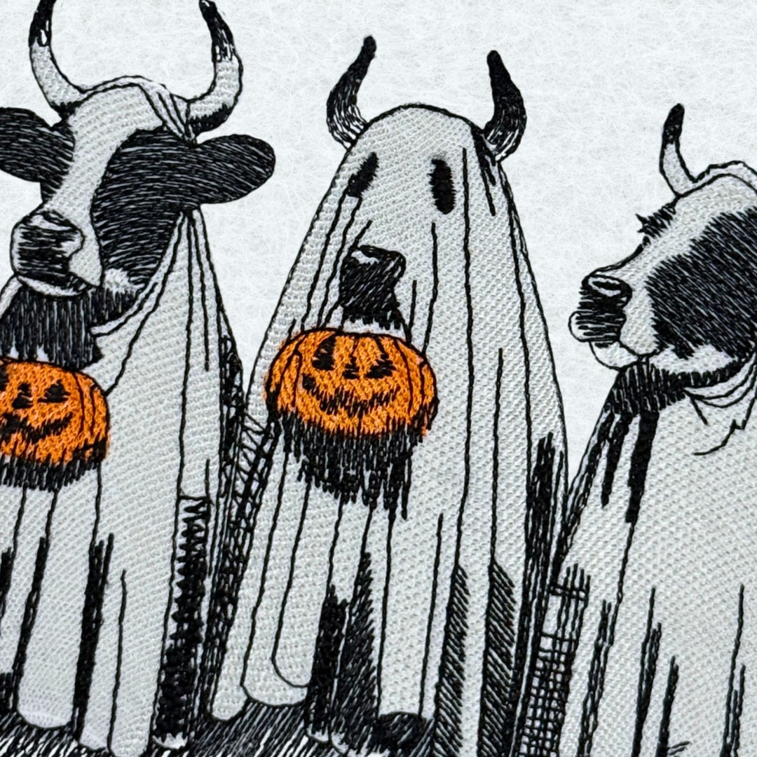 Spooky Cows With Pumpkin
