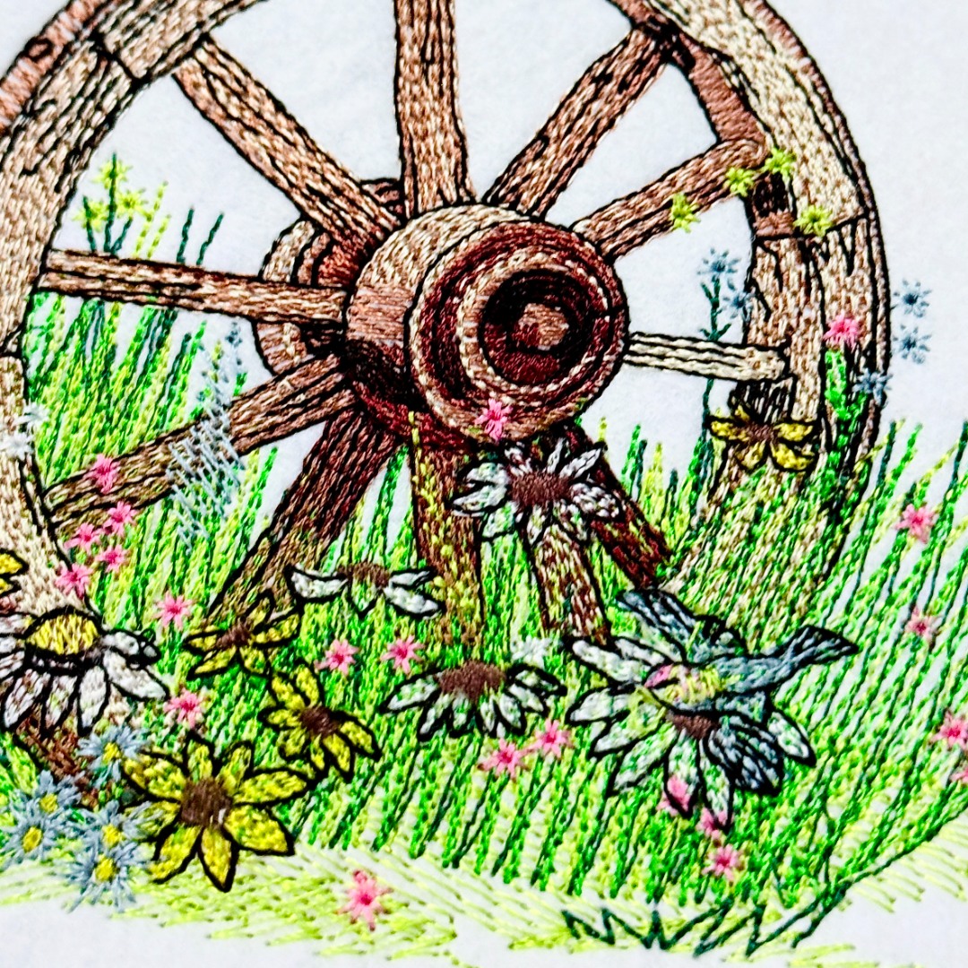 Bird On Wagon Wheel