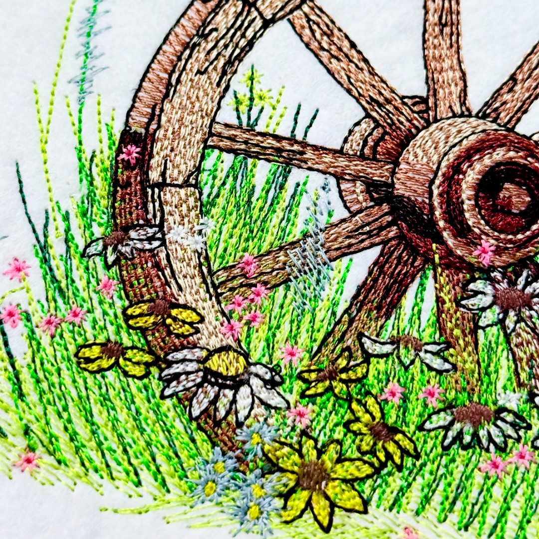 Bird On Wagon Wheel